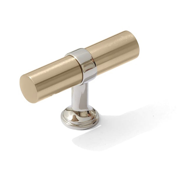 Gold cabinet handle on a white background