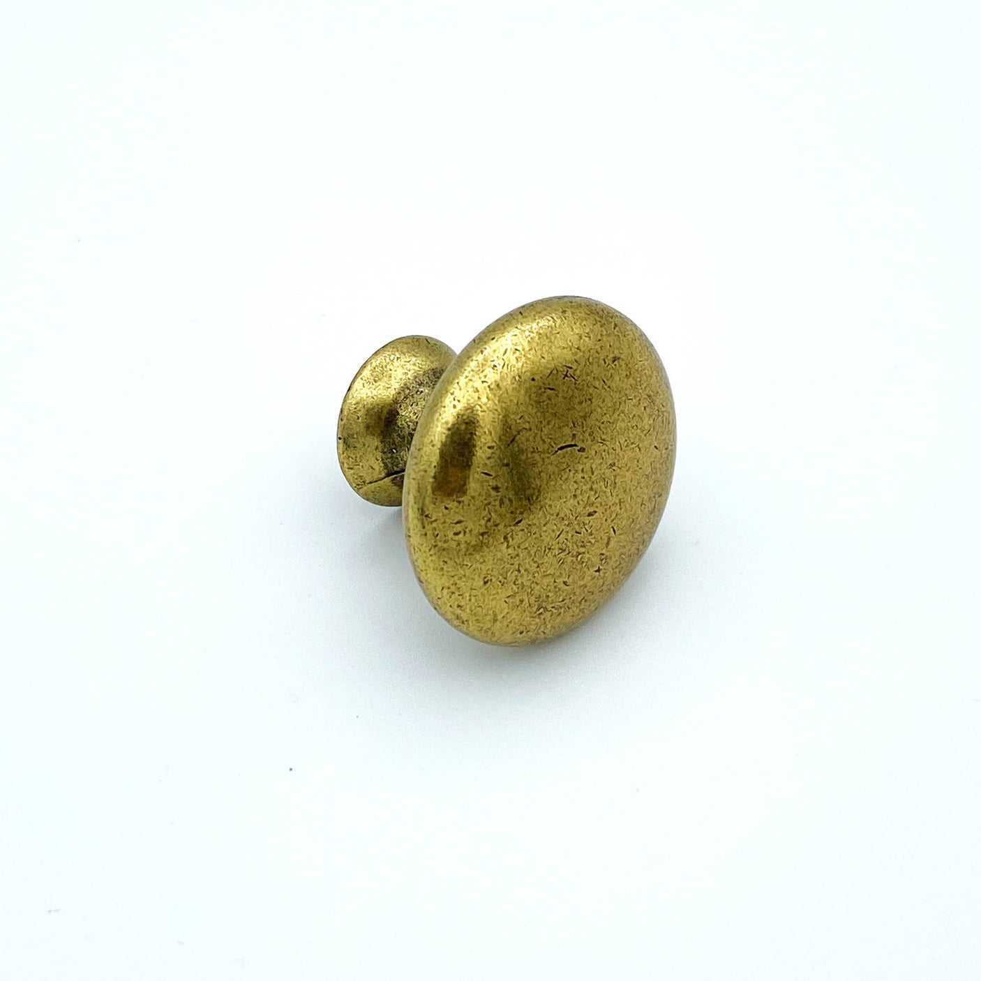 Capri Antique Brass Round Cabinet Knob - Forge Hardware Studio