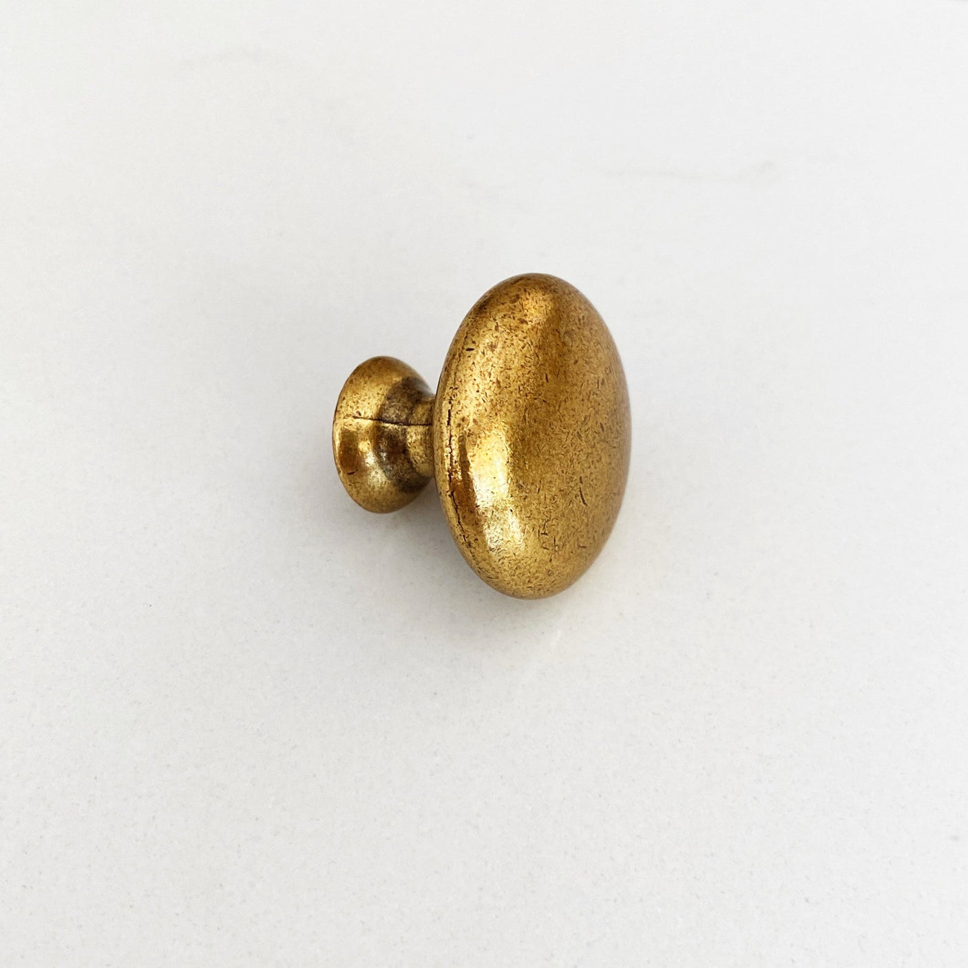 Capri Antique Brass Round Cabinet Knob - Forge Hardware Studio