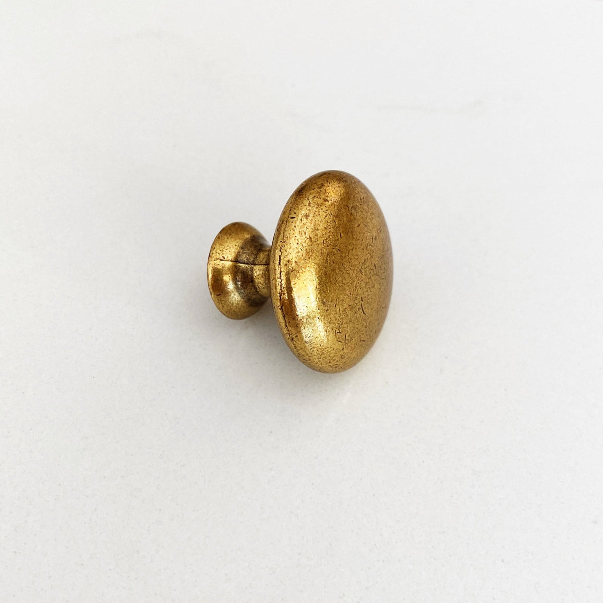 Capri Antique Brass Round Cabinet Knob - Forge Hardware Studio