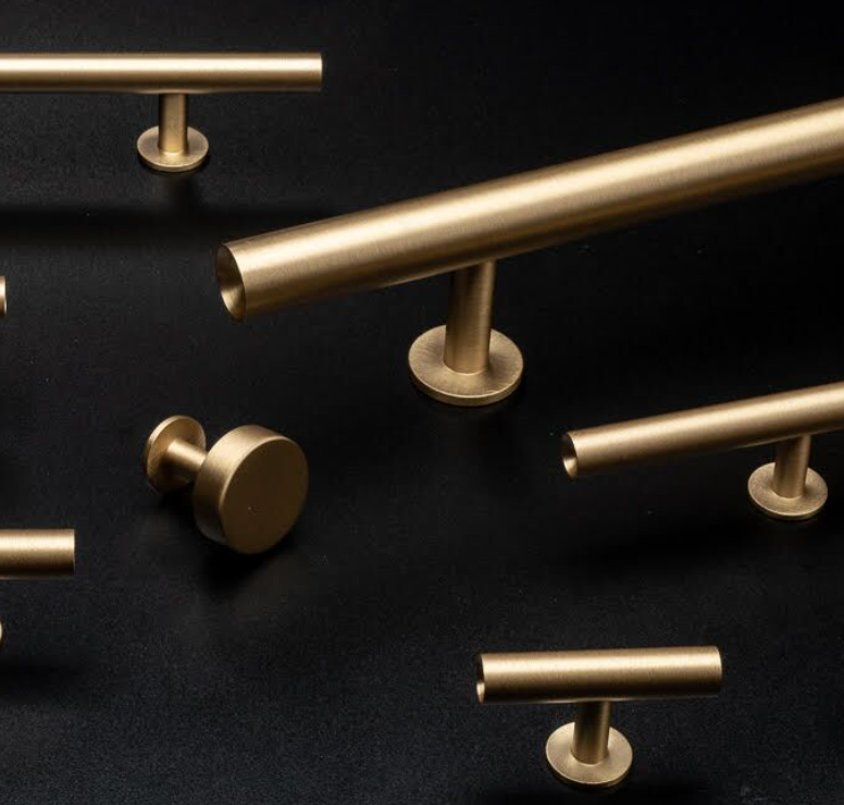 What is the difference between brass finishes in cabinet hardware such as polished brass, brushed brass, and satin brass?