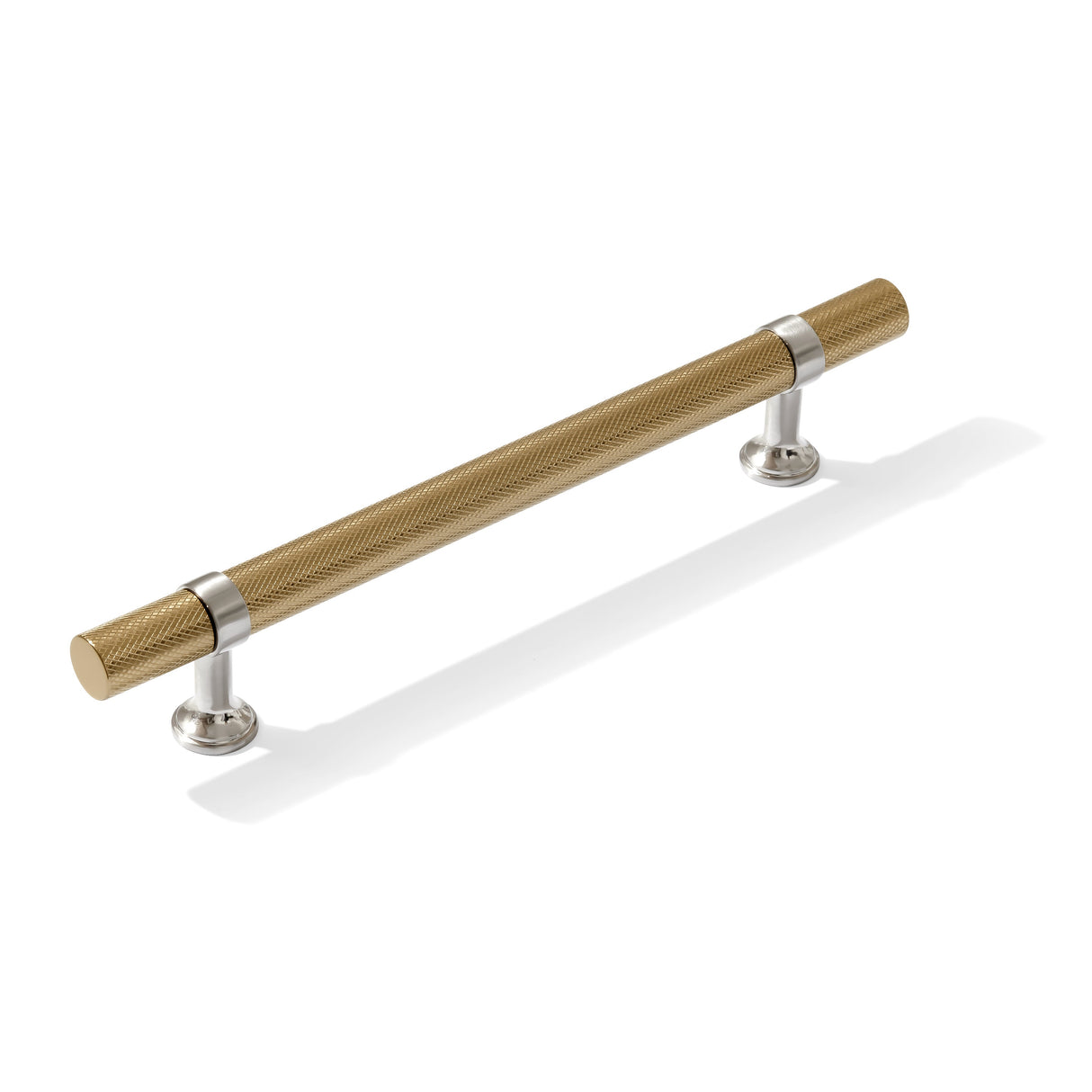 Gold cabinet handle with silver accents on a white background