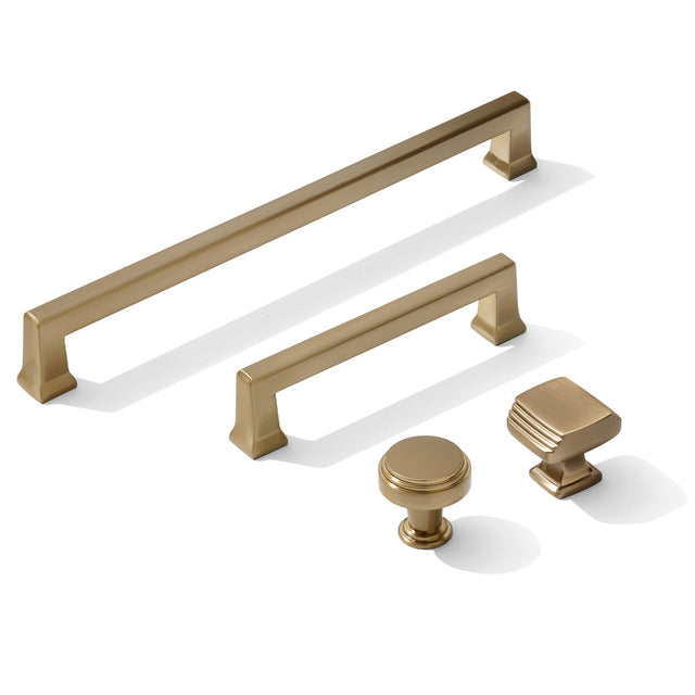 Set of champagne cabinet handles and knobs on a white background