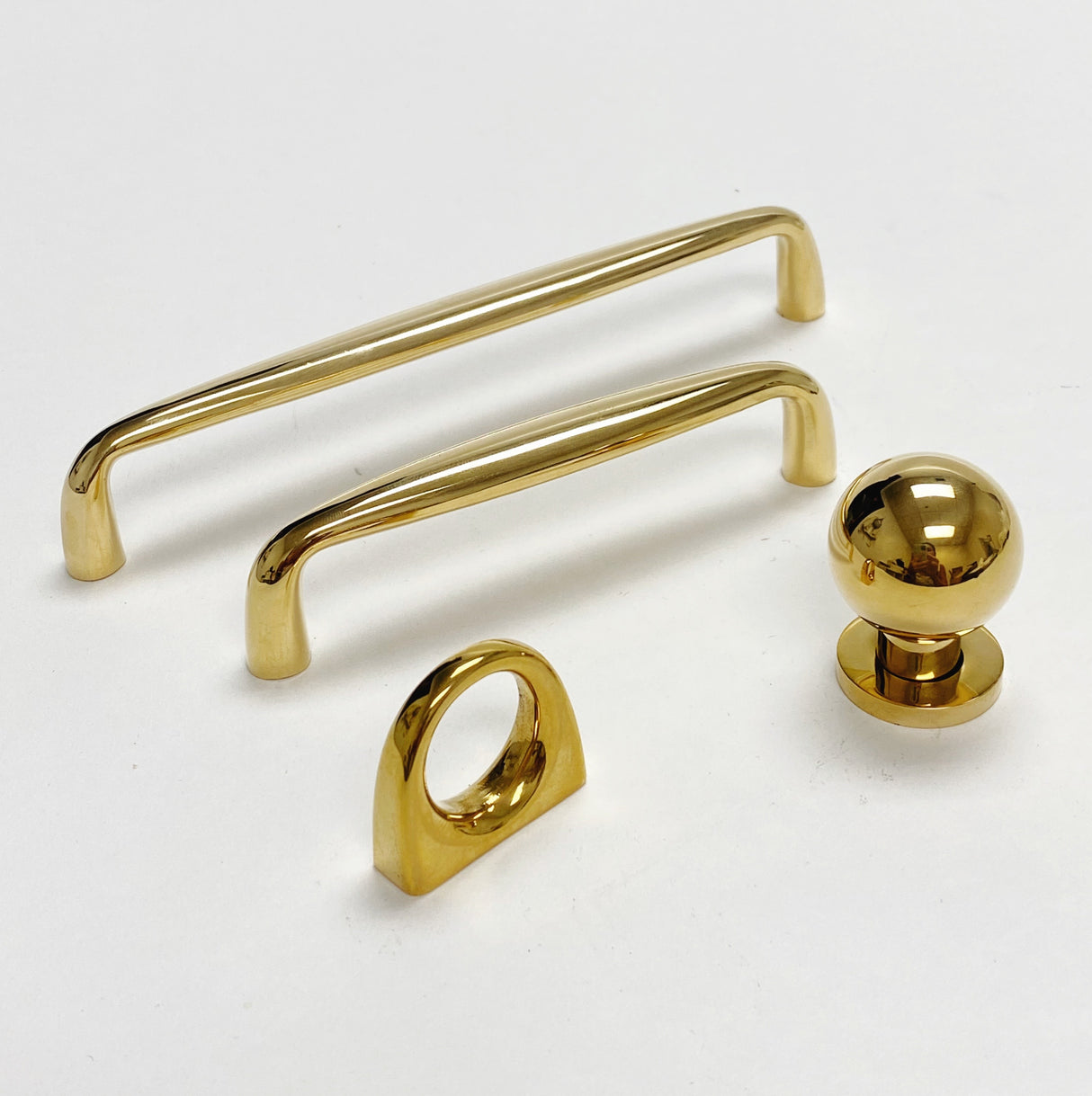 Omni Cabinet Knobs and Drawer Pulls in Polished Unlacquered Brass - Forge Hardware Studio