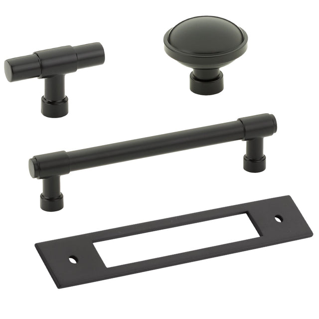 Set of black cabinet handles and a rectangular plate on a white background